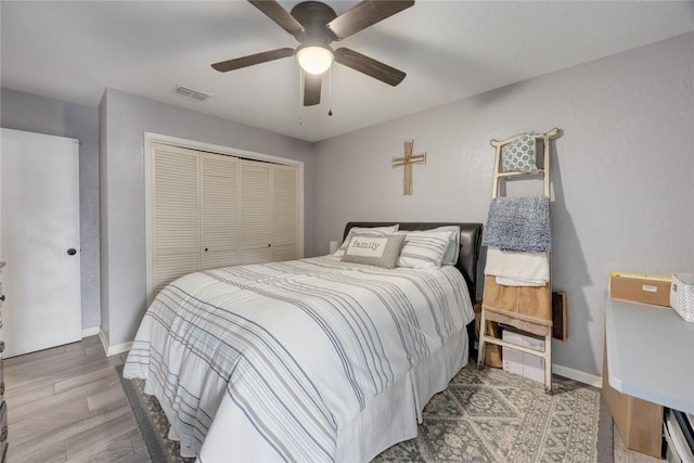 108 Lost Creek Dr, Portland, TX 78374 - bedroom featuring a closet, wood finished floors, baseboards, and a ceiling fan