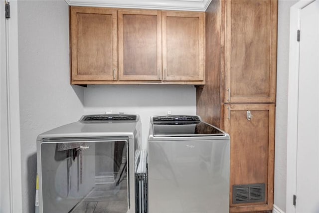 108 Lost Creek Dr, Portland, TX 78374 - washroom featuring washer and dryer, cabinet space, and baseboards