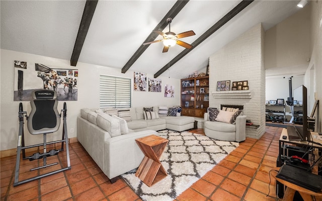 living room featuring high vaulted ceiling, beamed ceiling, ceiling fan, and a fireplace