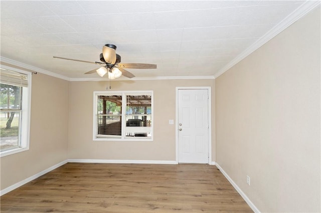 23861 County Road 1008, Mathis, TX 78368 - spare room with ceiling fan, wood finished floors, and a wealth of natural light