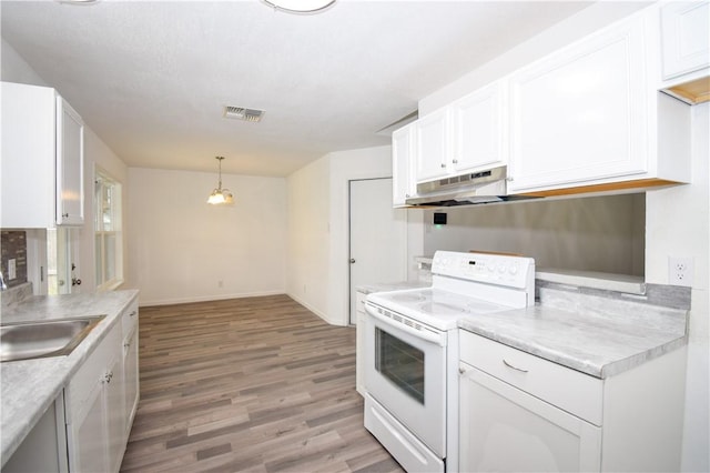 kitchen featuring pendant lighting, sink, white electric range, light hardwood / wood-style flooring, and white cabinets