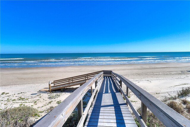 view of home's community with a view of the beach and a water view