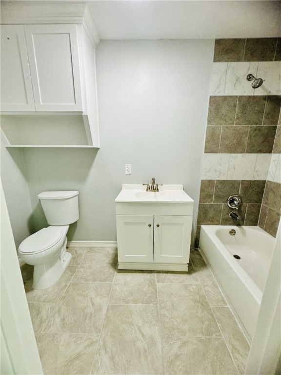 full bathroom featuring shower / tub combination, vanity, toilet, and tile patterned floors