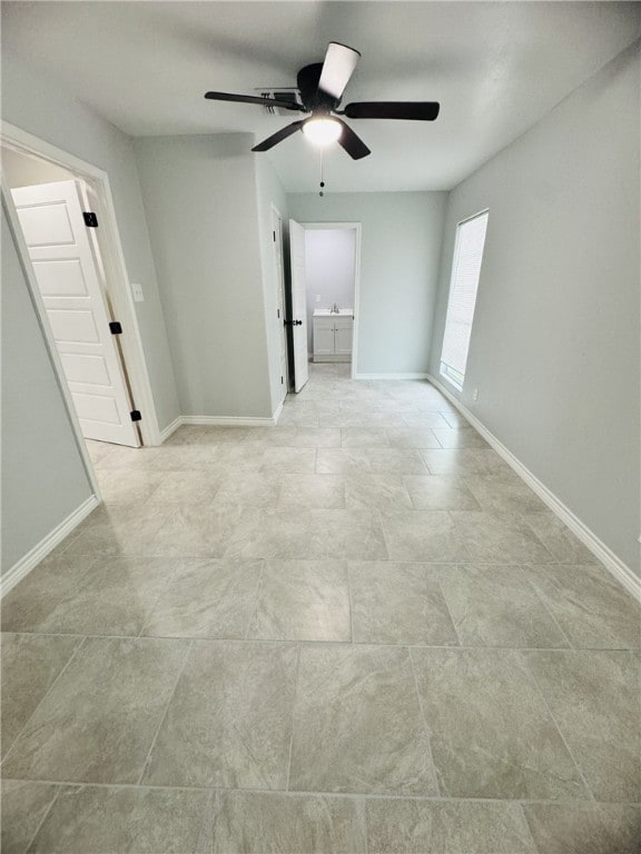 spare room featuring ceiling fan