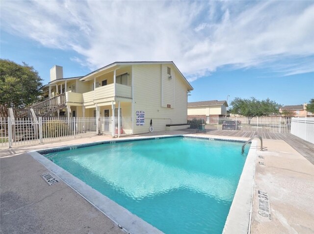 view of pool featuring a patio