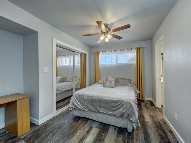 1011 Ennis Joslin Unit 224, Corpus Christi, TX 78412 - bedroom with multiple windows, dark wood-style floors, a closet, and baseboards