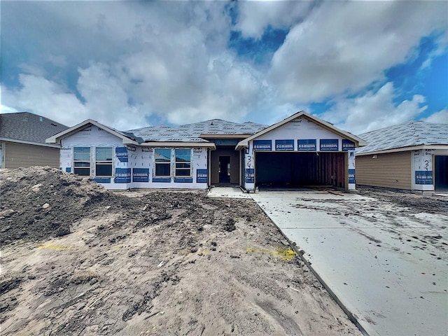 3405 Median Dr, Corpus Christi, TX 78414 - unfinished property featuring a garage and driveway