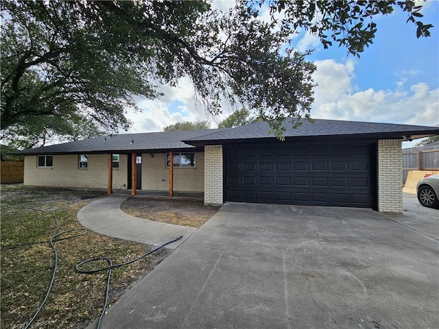 ranch-style home with a garage