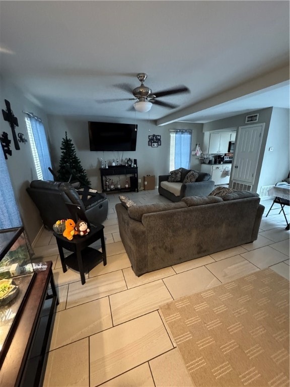 living room featuring ceiling fan