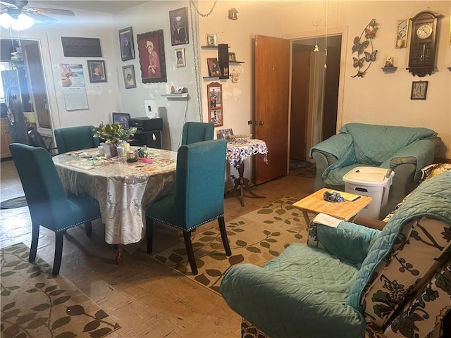 dining room with ceiling fan