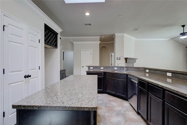 7505 Long S Dr, Corpus Christi, TX 78414 - kitchen featuring a sink, stainless steel dishwasher, a center island, crown molding, and a ceiling fan