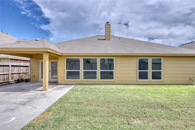 7505 Long S Dr, Corpus Christi, TX 78414 - rear view of property with a chimney, a patio, and roof with shingles