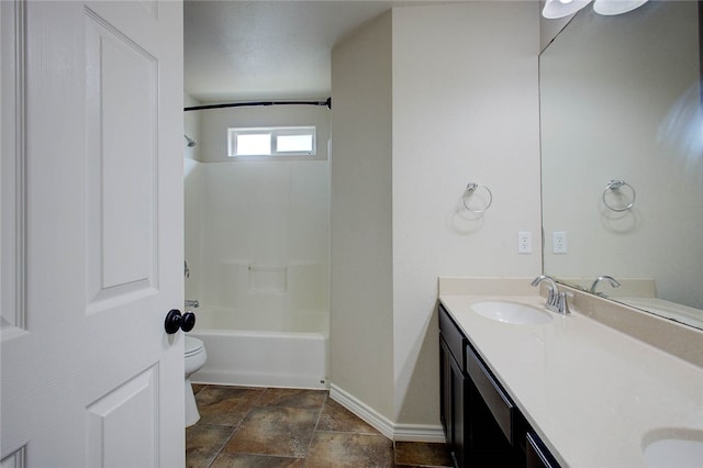 full bathroom with bathtub / shower combination, vanity, and toilet