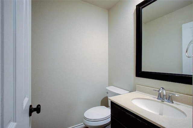 7505 Long S Dr, Corpus Christi, TX 78414 - half bathroom featuring toilet and vanity