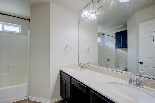 full bathroom featuring vanity, shower / bathing tub combination, and toilet