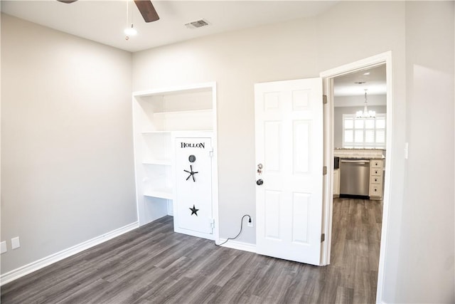 100 Lone Oak St, Portland, TX 78374 - unfurnished bedroom featuring dark wood finished floors, a chandelier, and baseboards