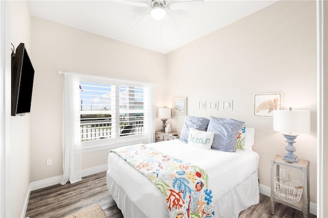 133 Barnacle Dr, Rockport, TX 78382 - bedroom with ceiling fan, baseboards, and wood finished floors