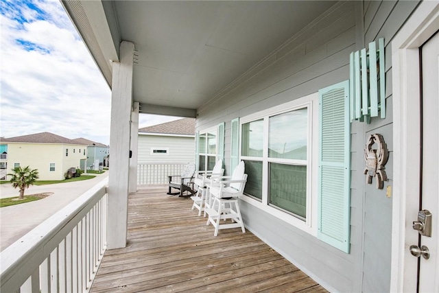 133 Barnacle Dr, Rockport, TX 78382 - wooden terrace with a residential view