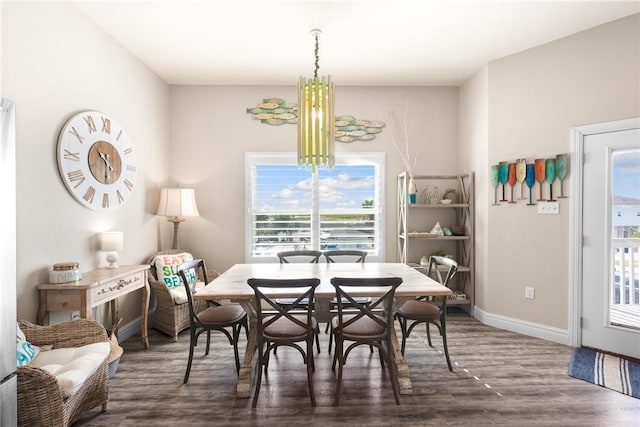 133 Barnacle Dr, Rockport, TX 78382 - dining space featuring baseboards and wood finished floors