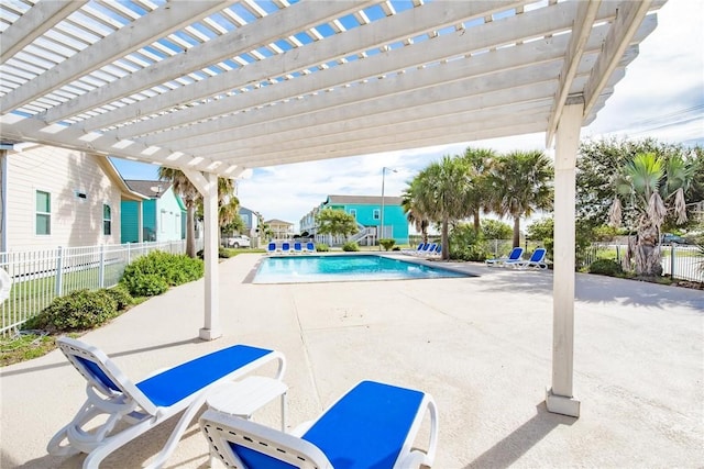 133 Barnacle Dr, Rockport, TX 78382 - community pool featuring a patio area and fence