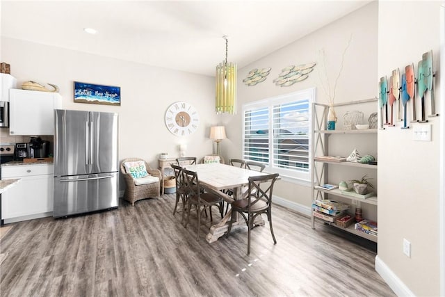 133 Barnacle Dr, Rockport, TX 78382 - dining room with light wood-type flooring and baseboards