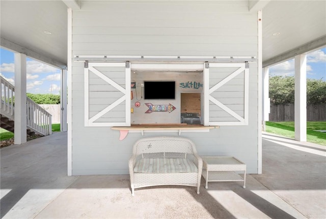 133 Barnacle Dr, Rockport, TX 78382 - view of patio / terrace with stairway and fence