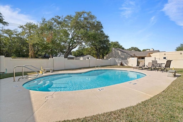 view of pool with a patio area