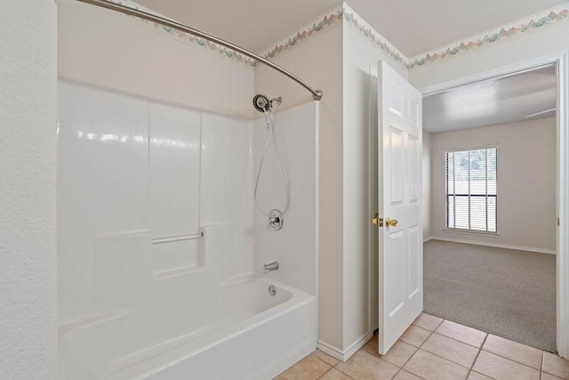 bathroom featuring shower / bathtub combination and tile patterned floors