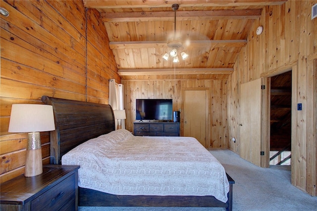 carpeted bedroom featuring lofted ceiling with beams, wooden walls, and wood ceiling