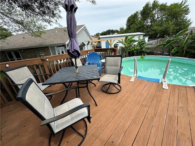 1510 Skyline Dr, Portland, TX 78374 - wooden deck with outdoor dining space and a fenced backyard