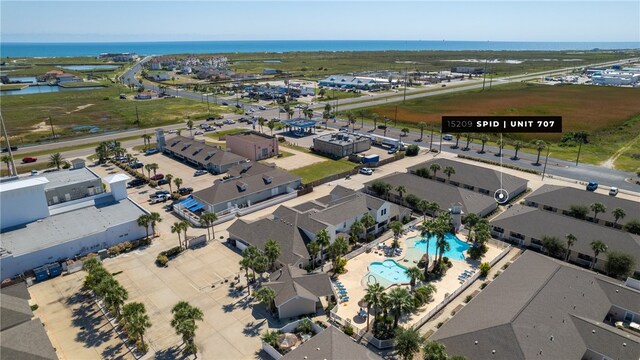 15209 S Padre Island Dr Unit 707, Corpus Christi, TX 78418 - bird's eye view of a pool and a nearby body of water