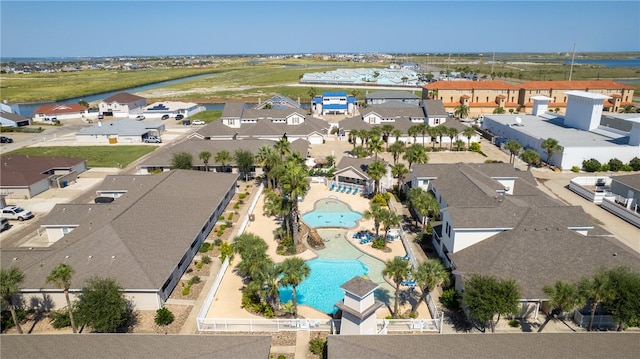 15209 S Padre Island Dr Unit 707, Corpus Christi, TX 78418 - aerial perspective of suburban area with a pool and a nearby body of water
