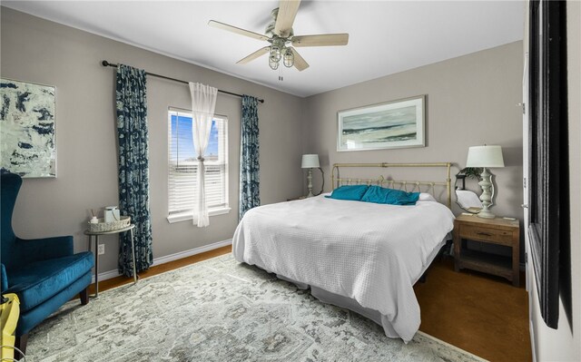 15209 S Padre Island Dr Unit 707, Corpus Christi, TX 78418 - bedroom with baseboards and ceiling fan