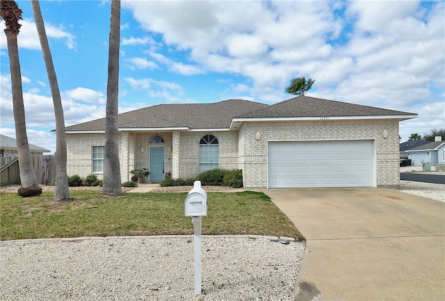 ranch-style house with a front lawn and a garage