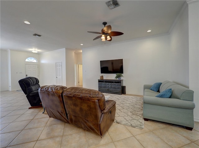 tiled living room featuring ornamental molding and ceiling fan