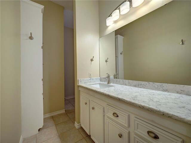 bathroom with vanity and tile patterned floors