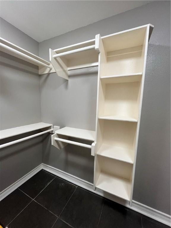 630 Sharon Dr, Corpus Christi, TX 78412 - walk in closet featuring dark tile patterned floors