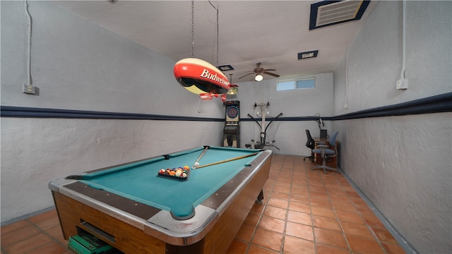 game room with pool table and light tile patterned floors