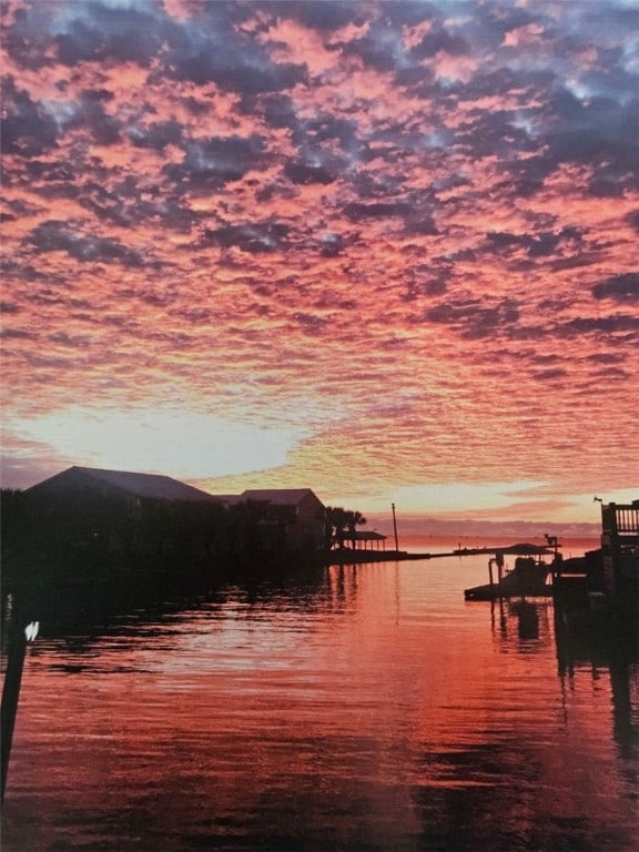 water view featuring a dock