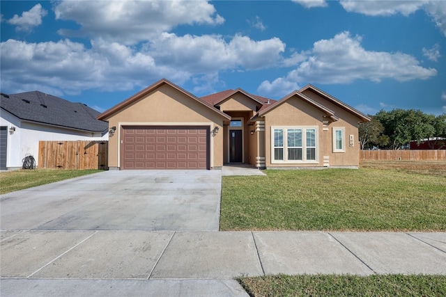 single story home with a garage and a front lawn