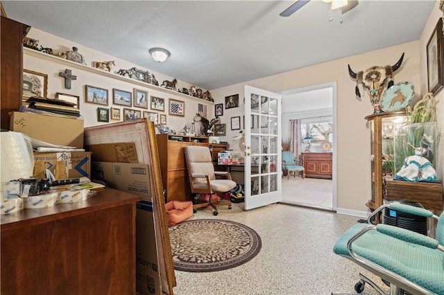 home office featuring ceiling fan and french doors