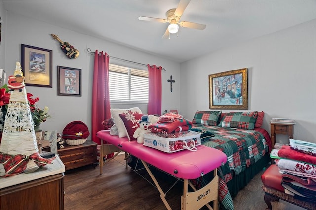 bedroom featuring ceiling fan and dark hardwood / wood-style floors