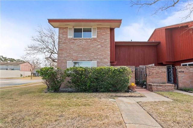 view of home's exterior with a lawn