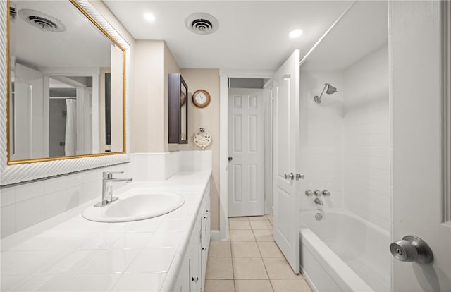 6845 Aswan Dr, Corpus Christi, TX 78412 - bathroom with vanity, tile patterned flooring, washtub / shower combination, and recessed lighting