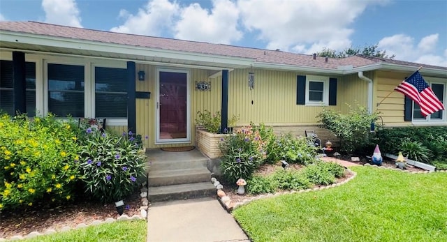 305 Circle Dr, Corpus Christi, TX 78412 - view of front of home featuring a front yard and a porch