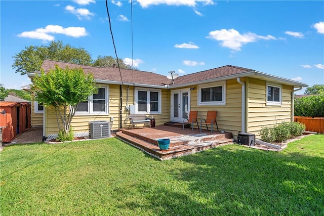 305 Circle Dr, Corpus Christi, TX 78412 - back of house with cooling unit, a deck, and french doors
