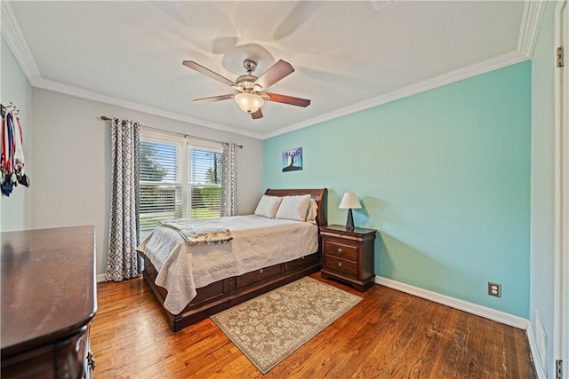 305 Circle Dr, Corpus Christi, TX 78412 - bedroom featuring wood finished floors, crown molding, baseboards, and ceiling fan