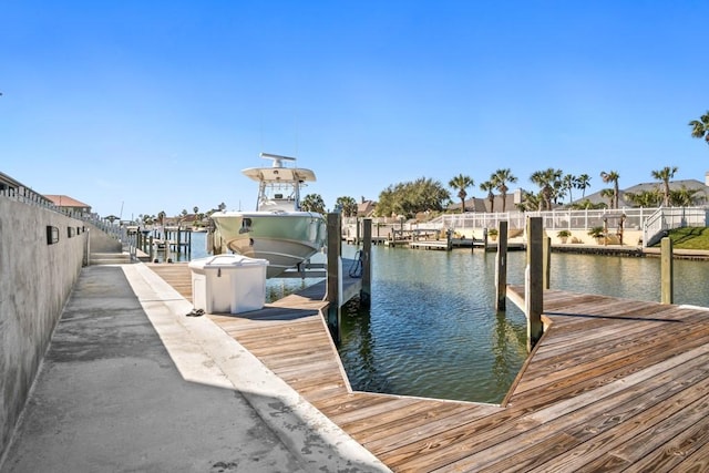 112 Dolphin Ct, Aransas Pass, TX 78336 - dock area featuring boat lift and a water view