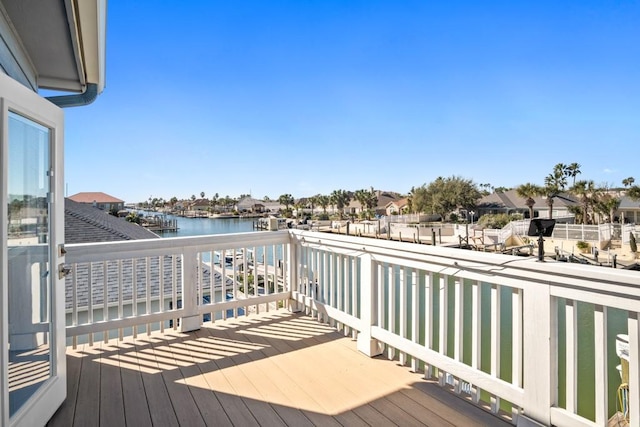 112 Dolphin Ct, Aransas Pass, TX 78336 - wooden terrace featuring a water view and a residential view