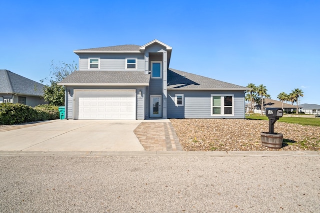 front of property with a garage